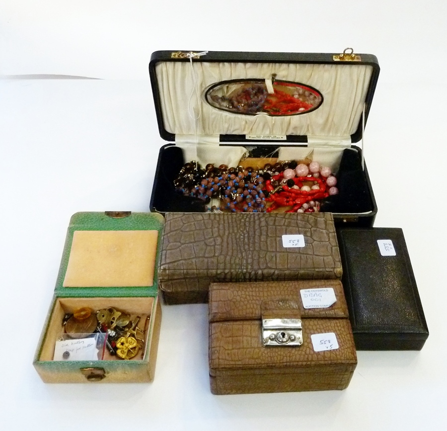 A selection of vintage jewellery, beads, brooches, pendants etc and two folding jewellery boxes,