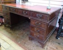 Edwardian mahogany directors desk, with inset red leather and gilt writing top, with arrangement