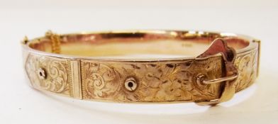 9ct gold bangle in the form of a buckle, scroll engraved, 13 grams approx