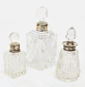 Three various silver mounted cut glass toilet jars