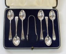 Set of six 1960s teaspoons and matching sugar tongs, all with engraved monogram, in fitted case, 3oz
