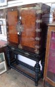 Circa 1900 Gillows Portuguese style rosewood burr walnut and ebonised cabinet on stand, after a 17th