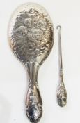 WITHDRAWN

An Edwardian silver-backed mirror, decorated with cherub faces, Chester 1905 and a