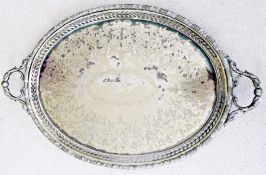 Late nineteenth century large oval plated two-handled tray, with foliate engraved decoration and