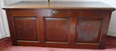 Eighteenth century elm and oak coffer, the front having three marquetry inlaid field panels and