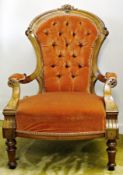 Late Victorian gentleman's walnut framed arm chair, having carved and  moulded ornamentation, deep