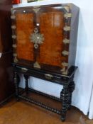 Circa 1900 Gillows Portuguese style rosewood, burr walnut and ebonised cabinet on stand, after a