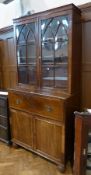 Twentieth century mahogany secretaire bookcase, astragal glazed cupboards above with arched