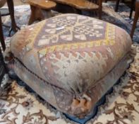 Square upholstered pouffe