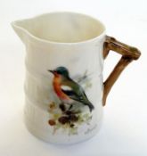 Royal Worcester porcelain miniature jug, painted with a bullfinch by H. Powell, signed, 6.5cm high