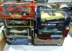A 1-18 scale diecast metal model of a Jeep Ground Cherokee, a Corgi MGF, an MGB Roadster, BMW Z3,