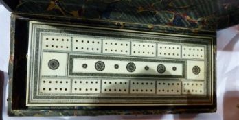 Old Anglo-Indian ivory, ebony and silver inlaid cribbage board, in case