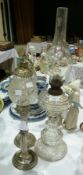 Glass base oil lamp and two others (3)