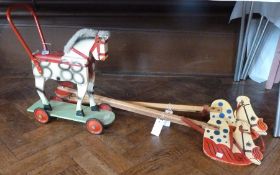A push along wooden horse by Leeway, Made in England, with two wooden hobby horses (3)
