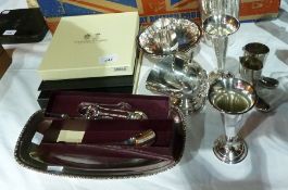 Various silverplated items to include:- trumpet-shaped vase, cocktail shaker, sugar nips etc