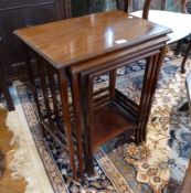 Mahogany nest of four tables, on straight supports, 52cm wide