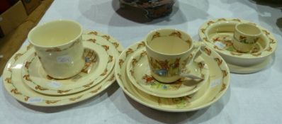 Royal Doulton "Bunnykins" china to include:- mug, cup and saucer, two dishes, two plates, eggcup and