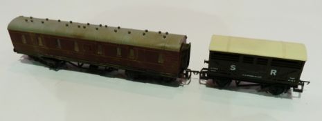 A small quantity 00 gauge rolling stock, and empty boxes