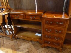 Reproduction mahogany nest of three tables, small chest of four short drawers, on bracket feet,