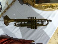 A Boosey & Hawkes brass Oxford Trumpet with three valves, length 55cms