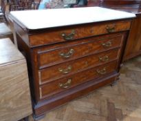 Mahogany chest of four long drawers, with brass handles, marble top (top does not match chest), on
