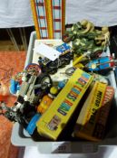 A large quantity of tinplate and other toys including two boxed reproduction "Schuco" racing cars