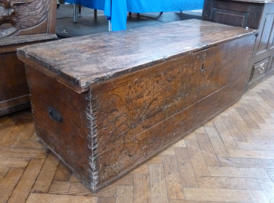 18th century continental fruitwood coffer, with incised decoration, decorated with lions, mythical