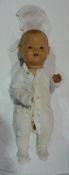 Sprayed bisque headed baby doll, made in Germany HW, with fixed brown eyes, open mouth, two