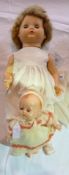 Palitoy walking plastic doll, with blond wig, and small BND 1930s/40s celluloid baby doll