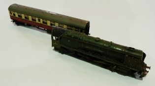 A quantity 0 gauge locomotives, coaches, track etc (2 boxes)