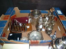 Various silverplated items to include:- large sugar sifter, eggcup and break fast set, toastrack,