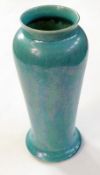 Ruskin pottery vase, slender and tall ovoid shape with spreading foot, in turquoise iridescent