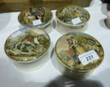 Four decorated lidded pots, various scenes to include:- "I See You my Boy". etc (af) (4)