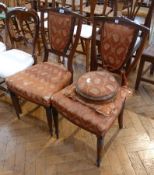 A pair of Edwardian rosewood shield back dining chairs, with upholstered padded back, upholstered