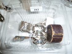 Five assorted silver napkin rings, one in leather case, silver pencil, silver sugar nips, silver