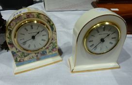 Two Wedgwood porcelain cased quartz mantel clocks, one with floral decoration, the other in white (