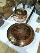 An old copper warming pan with turned wooden handle, together with an old copper kettle (2)