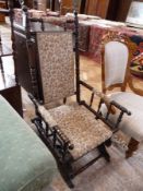 Victorian stained wood platform rocker, with turned wood back and side with floral upholstery on