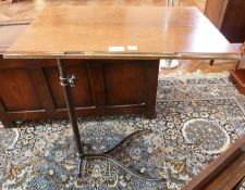 Stained wood and metal overbed table, stained wood folding occasional table and a cased sewing