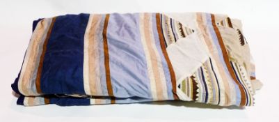 18th century silk patchwork quilt, laid on blue fabric lining