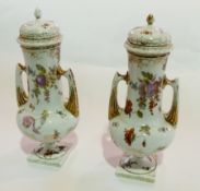 Pair Vienna style porcelain vases and covers, each footed and two-handled, transfer printed