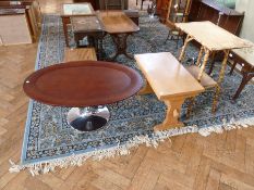 Modern stained wood and chrome coffee table, oval with dished top, on circular chrome base, pine