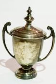 Silver two-handled and lidded miniature trophy cup, urn-shaped with pair upswept scroll handles