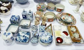 Large quantity contemporary oriental blue and white ceramics, two ivory-coloured resin oriental