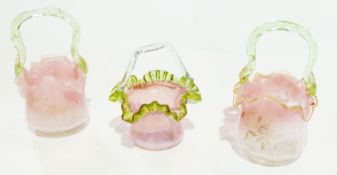 Three Victorian pink and green vaseline frilled posy vases