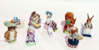 Eight Beswick Beatrix Potter figures, including "Mrs Rabbit and bunnies" and Wedgwood "Grandma