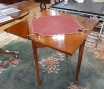 Mahogany envelope card table, with swivel top, opening to reveal gilt tooled leather inlaid to the