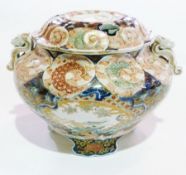 Large 19th century Japanese porcelain koro, ovoid with pair kylin handles, allover Imari