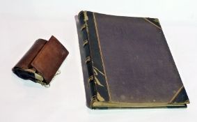 A leather bound fly wallet with compartments for flies and empty photograph album