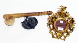 A carved wooden baton, carved wooden apple, various wooden animals and a small oval gilt foliate
